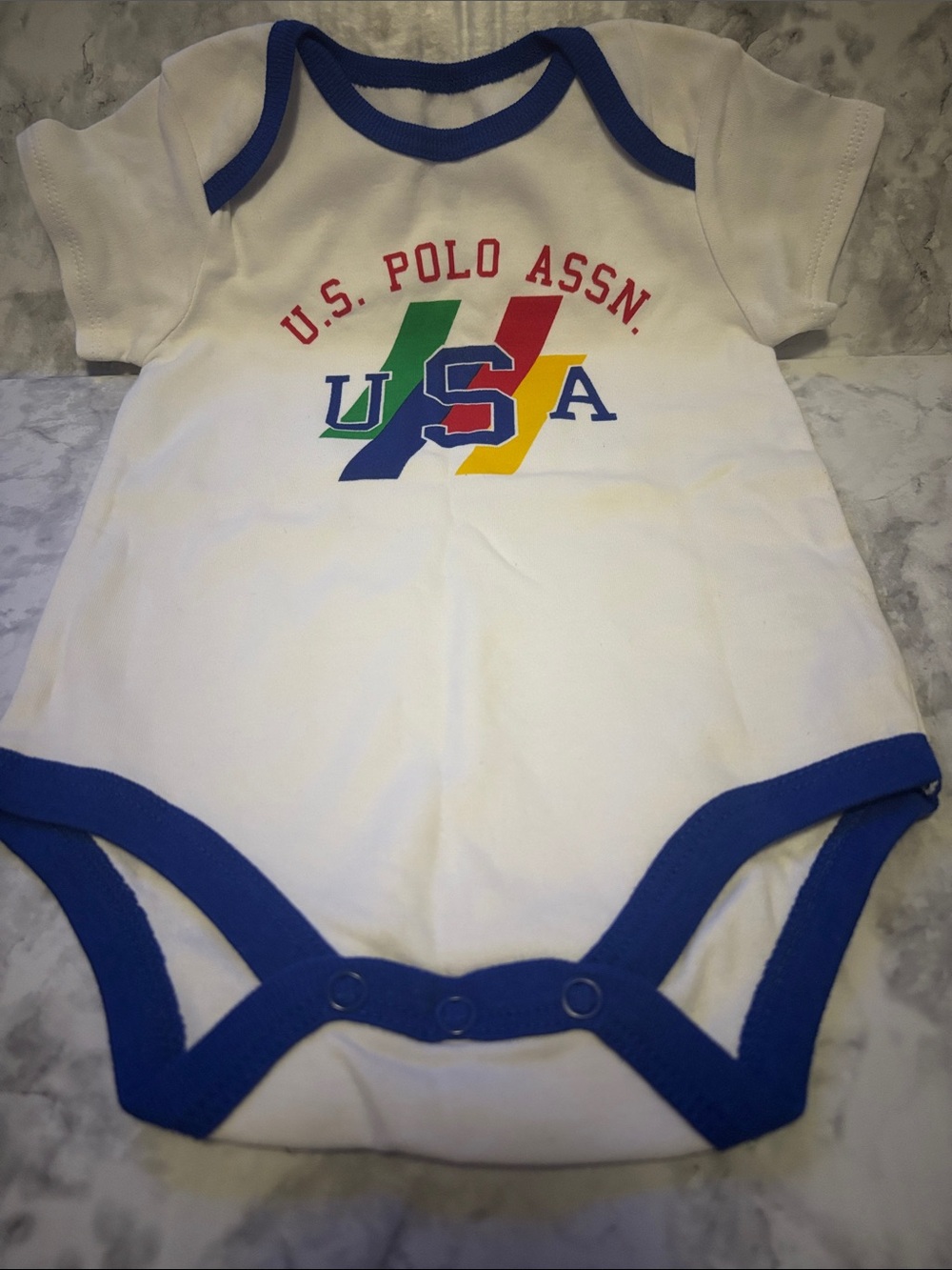 U.S. Polo Assn. White One-Piece with Blue Trim and Multicolor USA Graphic